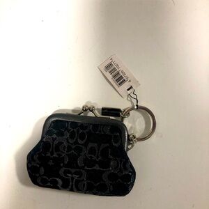 Coach black coin purse keychain. Never used. Black with shimmery stitching. NWT